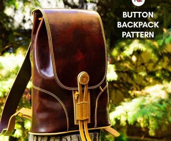 Рюкзак из кожи на пуговицах и лямках