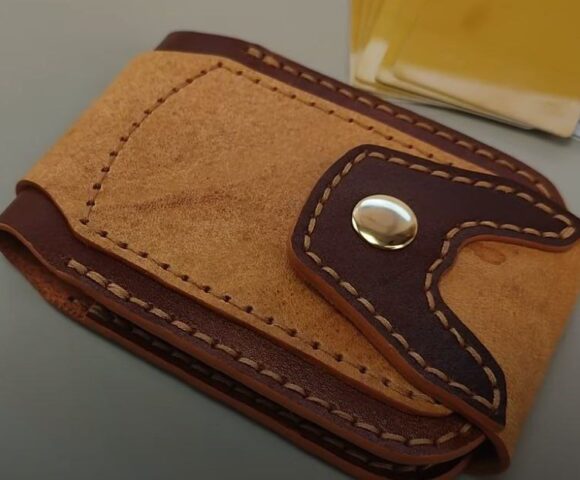 Кошелек из кожи бифолд сделанный на кнопке выкройка