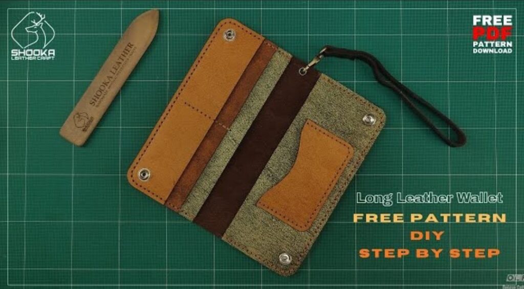 Лонгер удобный стильный из кожи с ремешком на руку выкройка